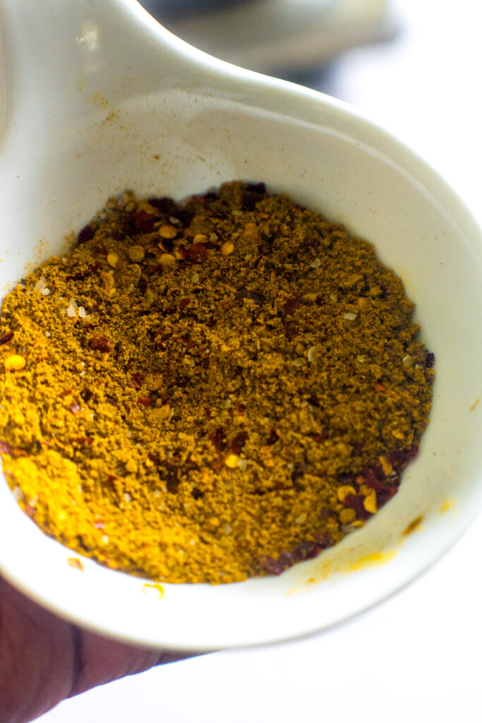 Spice blend in a small white bowl. 